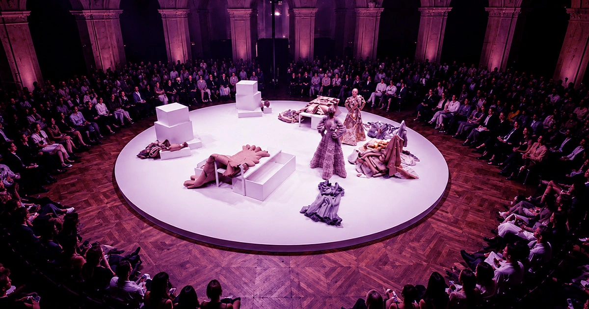 Viktor & Rolf's moving circular runway transformed the fashion show into a live theatrical performance.