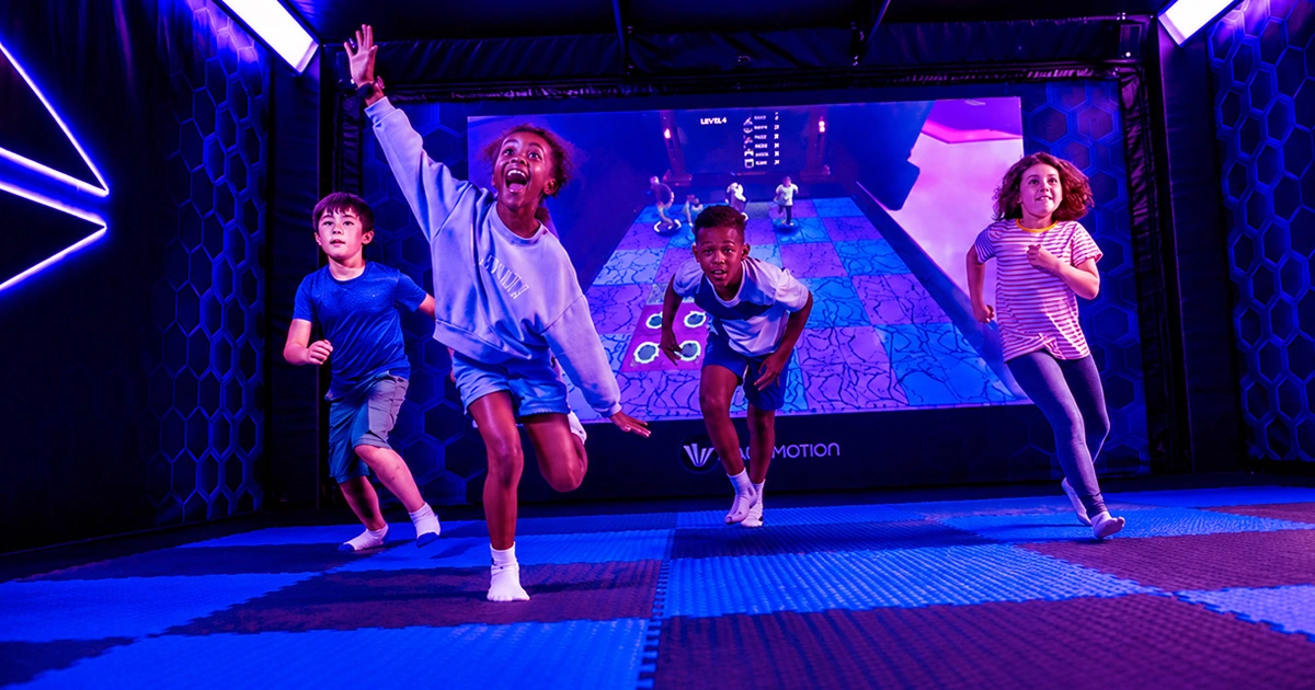 Visitors interact with a physical gaming environment designed around participation, exploration and community